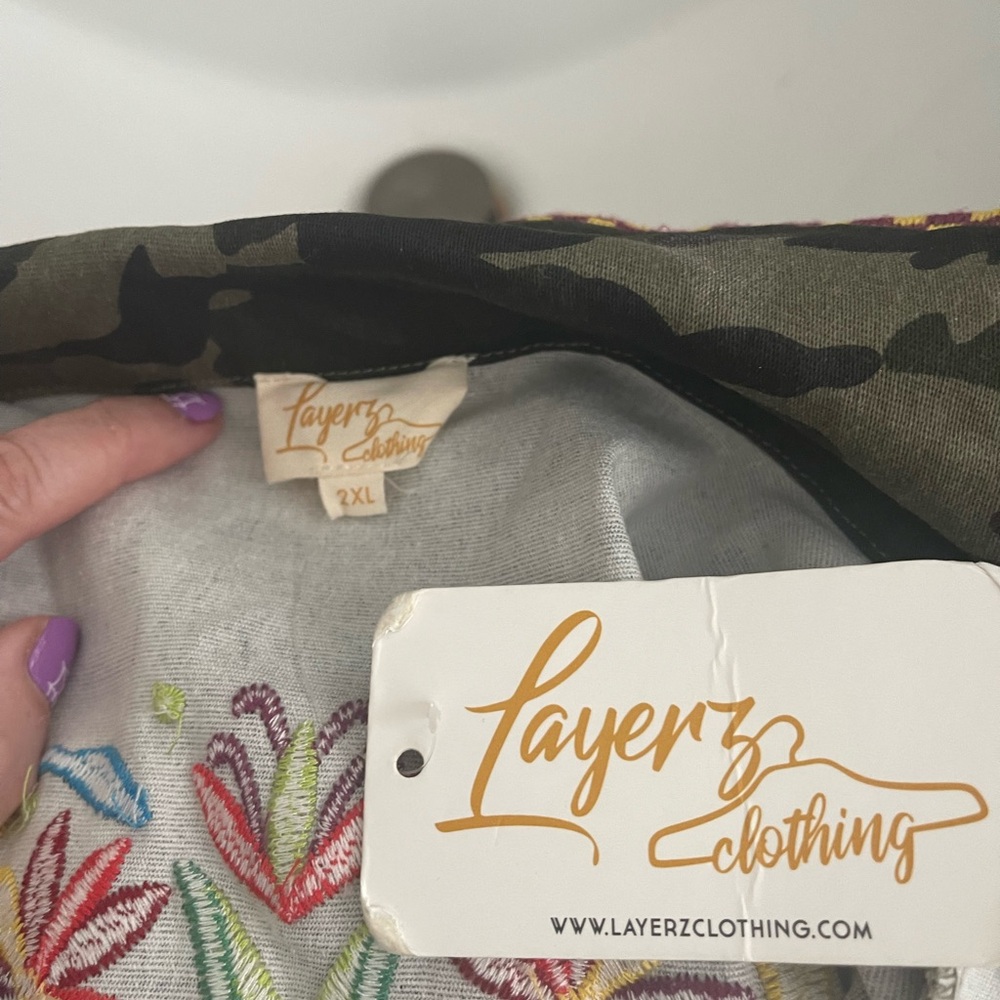 Hip length camo vest, Phoenix embroidery, patch pockets at hip size 2XL - Picture 14 of 14